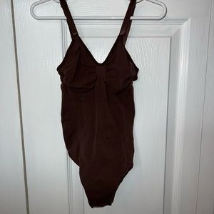 Skims thong bodysuit in Cocoa
